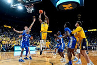 Morez Johnson Jr. (21), Will Tschetter (42), Nimari Burnett (4), and Yaxel Lendeborg (23)