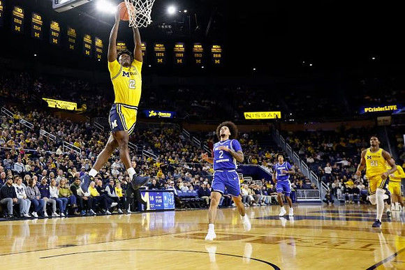 L.J. Cason (2) and Morez Johnson Jr. (21)
