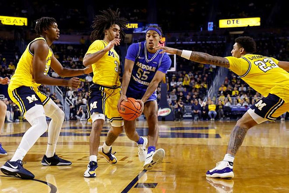 Morez Johnson Jr. (21), Elliot Cadeau (3), and Yaxel Lendeborg (23)