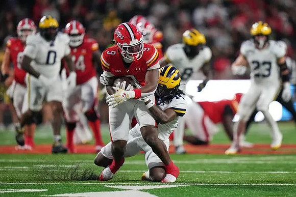 Tré Williams (0), Derrick Moore (8), Cole Sullivan (23), and Jordan Young (14)