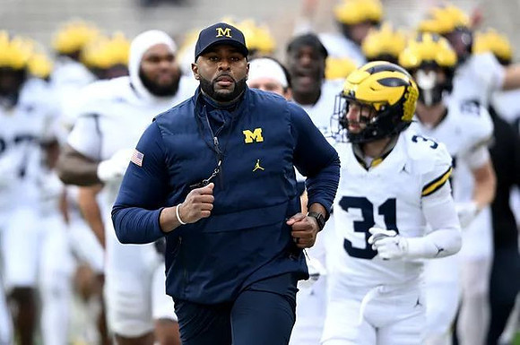 Sherrone Moore and Michigan Team