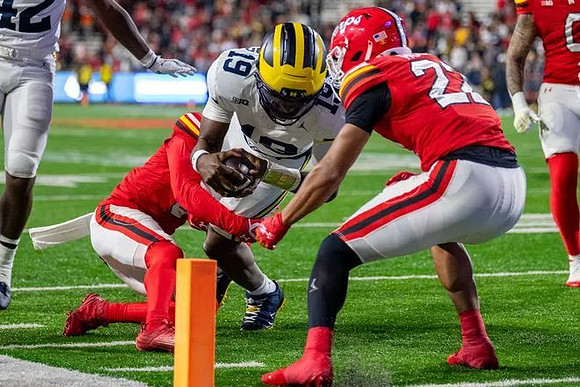 Jalen Hoffman (42) and Bryce Underwood (19)