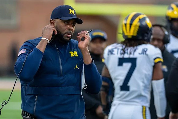 Sherrone Moore and TJ Metcalf (7)