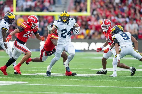 Andrew Marsh (4), Bryson Kuzdzal (24), and Channing Goodwin (9)