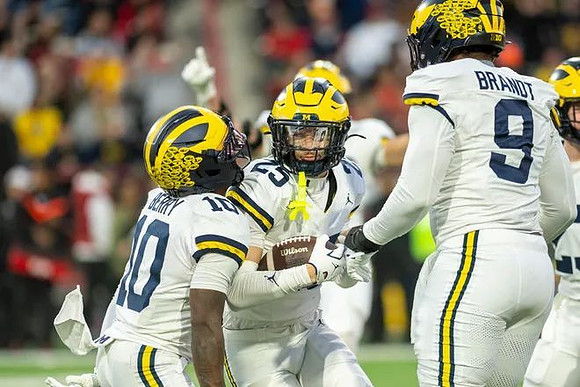 Zeke Berry (10), Mason Curtis (25), and Cameron Brandt (9)
