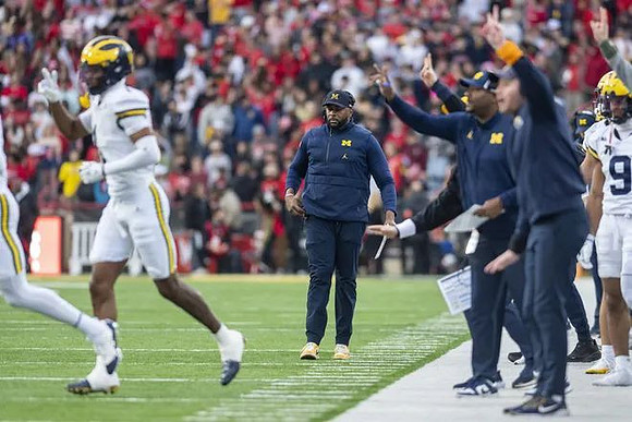 Sherrone Moore and Michigan Team