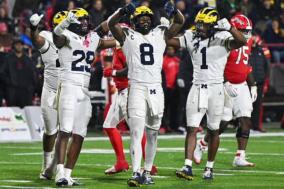 Chase Taylor (29), Derrick Moore (8), and Jaishawn Barham (1)