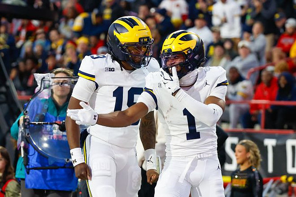 Bryce Underwood (19) and Donaven McCulley (1)