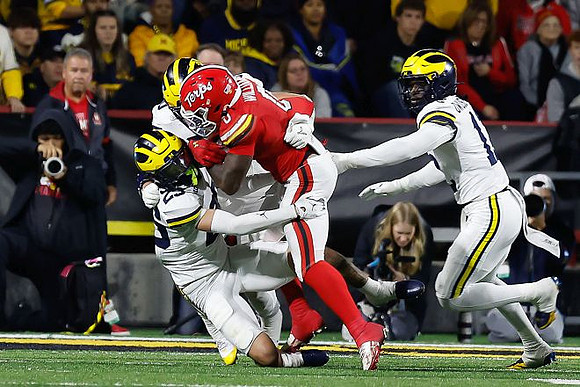 Cole Sullivan (23) and Nathaniel Owusu-Boateng (12)