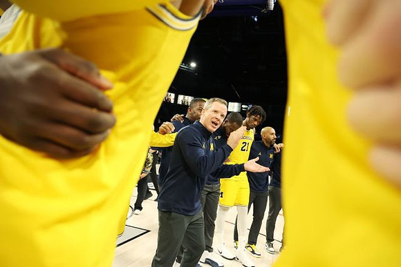 Dusty May and Michigan Team