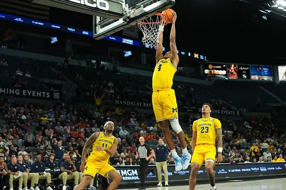 Roddy Gayle Jr. (11), Nimari Burnett (4), and Yaxel Lendeborg (23)