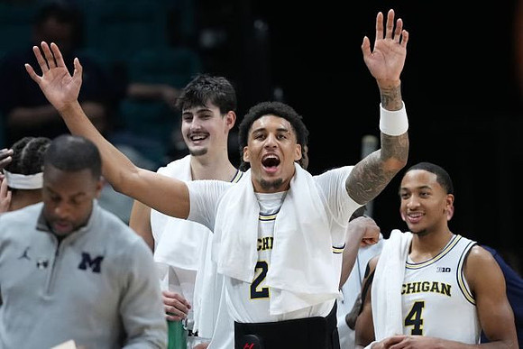 Aday Mara (15), Yaxel Lendeborg (23), and Nimari Burnett (4)