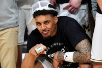 Yaxel Lendeborg (23) and Players Era Tournament Championship MVP Ring