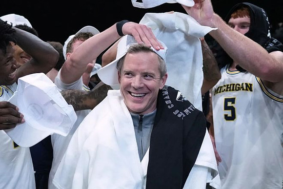 Dusty May and Michigan Team