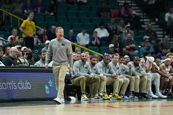 Dusty May and Michigan Team