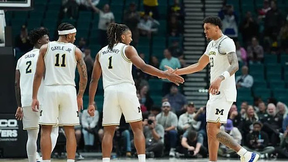 L.J. Cason (2), Roddy Gayle Jr. (11), Trey McKenney (1), and Yaxel Lendeborg (23)