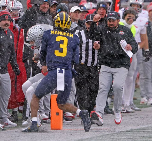 Jaden Mangham (3) and Ohio State Head Coach Ryan Day