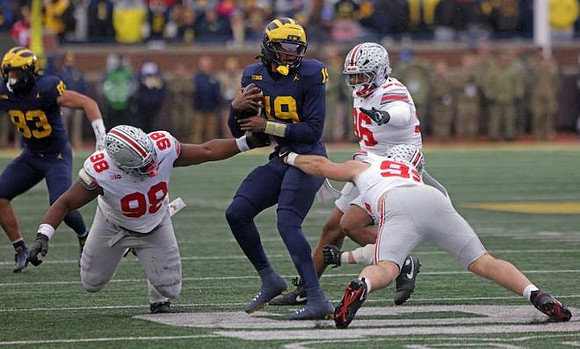 Zack Marshall (83) and Bryce Underwood (19)