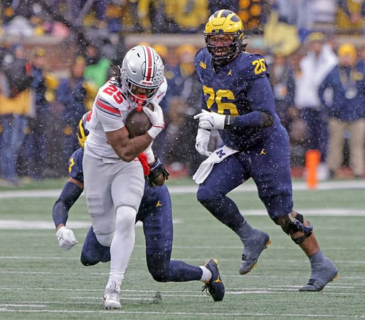 TJ Metcalf (7) and Rayshaun Benny (26)