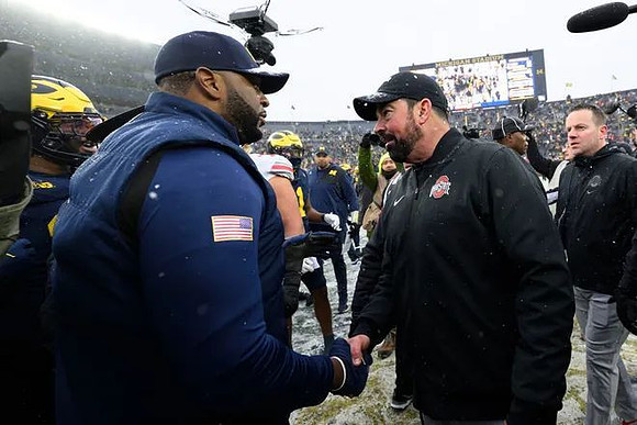 Sherrone Moore and Ohio State Head Coach Ryan Day