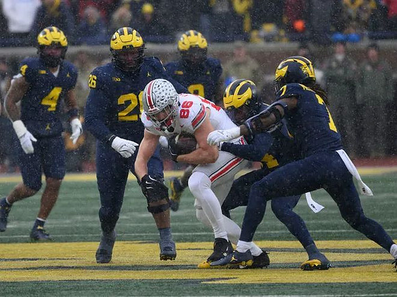 TJ Guy (4), Rayshaun Benny (26), and TJ Metcalf (7)
