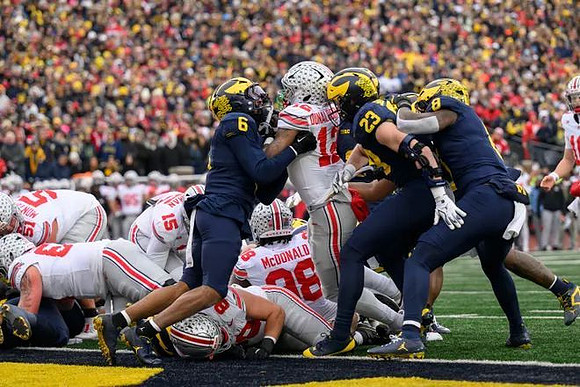 Brandyn Hillman (6), Cole Sullivan (23), and Derrick Moore (8)