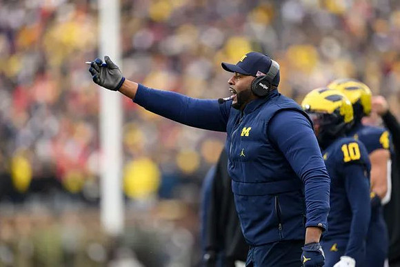 Sherrone Moore and Michigan Team