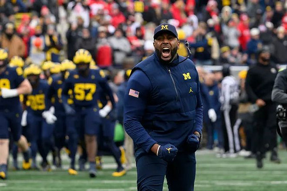 Sherrone Moore and Michigan Team