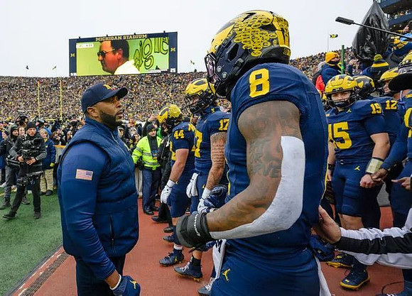 Sherrone Moore and Michigan Team