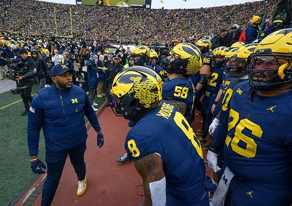 Sherrone Moore and Michigan Team