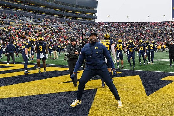 Sherrone Moore and Michigan Team