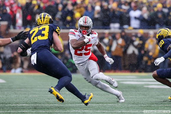 Cole Sullivan (23) and Jyaire Hill (20)