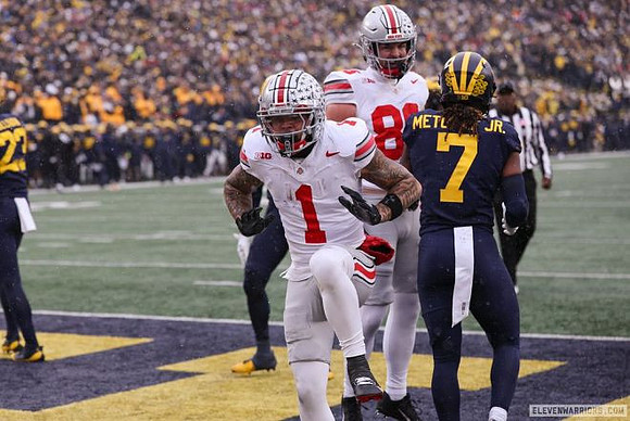 Cole Sullivan (23) and TJ Metcalf (7)
