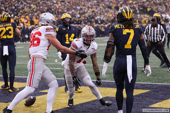 Cole Sullivan (23), Jordan Young (14), and TJ Metcalf (7)