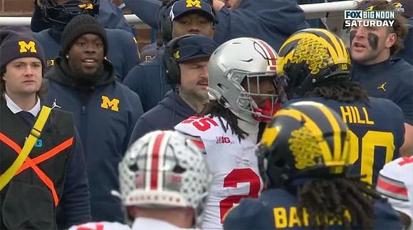 Jaishawn Barham (1) and Jyaire Hill (20)