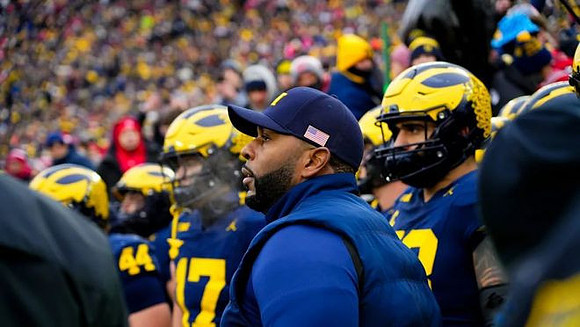 Sherrone Moore and Michigan Team