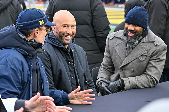 Tom Brady and Charles Woodson
