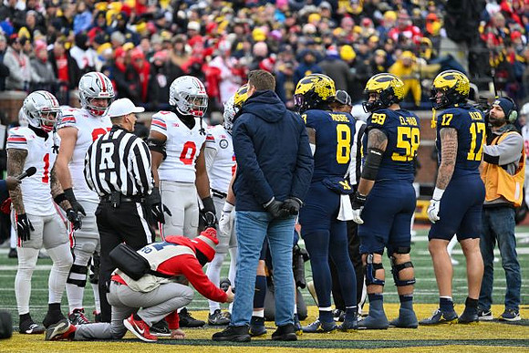 Derrick Moore (8), Giovanni El-Hadi (58), and Marlin Klein (17)