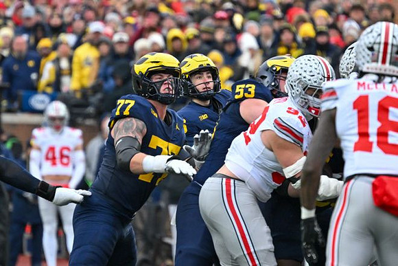 Blake Frazier (77), Dominic Zvada (96), and Jake Guarnera (53)