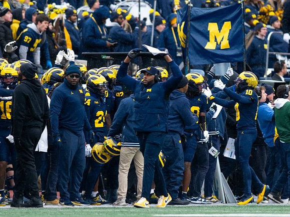 Sherrone Moore and Michigan Team