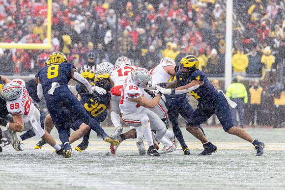 Derrick Moore (8), Jimmy Rolder (30), and TJ Guy (4)