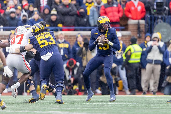 Jake Guarnera (53) and Bryce Underwood (19)