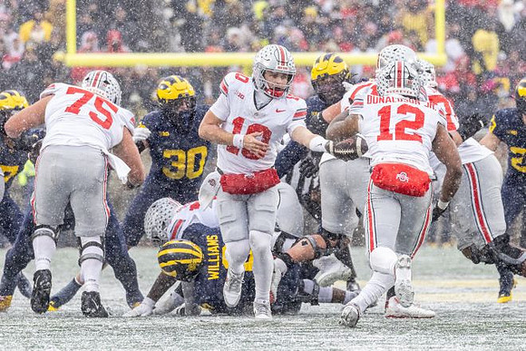 Jimmy Rolder (30), Tré Williams (0), and Cole Sullivan (23)