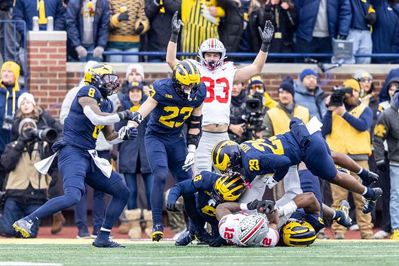 Derrick Moore (8), Cole Sullivan (23), Brandyn Hillman (6), and Chase Taylor (29)