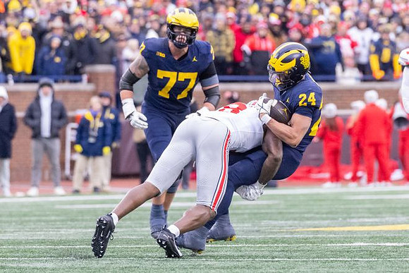 Blake Frazier (77) and Bryson Kuzdzal (24)