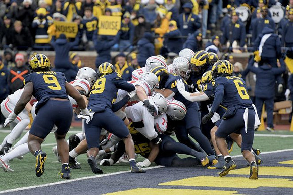 Cameron Brandt (9), Chase Taylor (29), Damon Payne (44), Jimmy Rolder (30), and Brandyn Hillman (6)