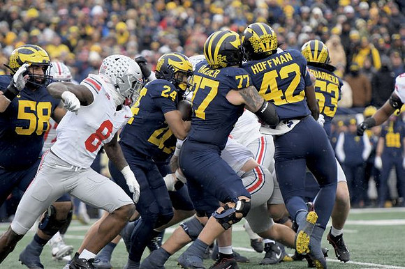 Giovanni El-Hadi (58), Bryson Kuzdzal (24), Blake Frazier (77), Jalen Hoffman (42), and Jake Guarnera (53)