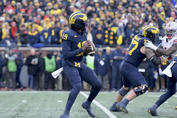 Bryce Underwood (19) and Blake Frazier (77)