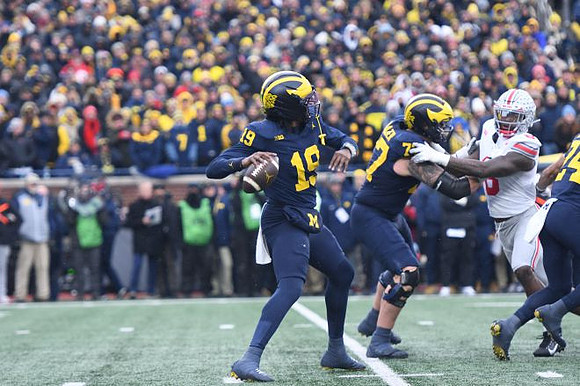 Bryce Underwood (19) and Blake Frazier (77)