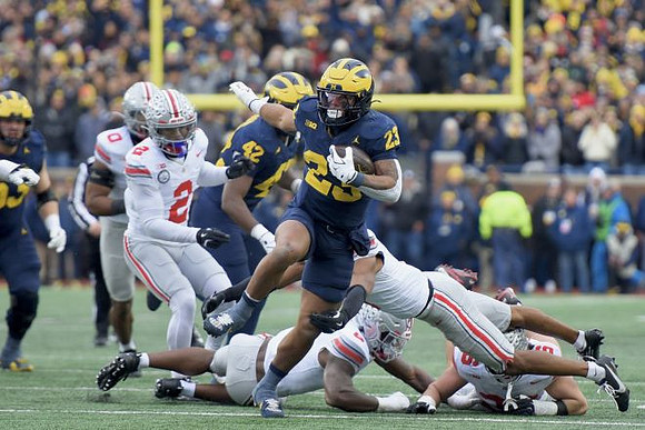 Jake Guarnera (53), Jalen Hoffman (42), and Jordan Marshall (23)